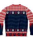 Back view of red and navy Christmas sweater with paw prints, snowflakes, and plaid sleeve design — festive dog lover sweatshirt from CollegeWares.