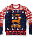 Red and navy ugly Christmas sweater with a dachshund dog in a Santa hat and the phrase “Admit it you want to hold my wiener” — novelty holiday sweatshirt from CollegeWares.