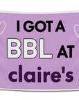 Funny college flag featuring the phrase “I Got a BBL at Claire’s” in bold text against a soft purple background with simple white heart illustrations. This absurd meme inspired college flag brings chaotic humor to dorm rooms, student apartments, and funny wall decor collections from CollegeWares.