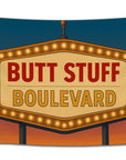 Vegas-style marquee sign flag with glowing lights and bold red text reading “Butt Stuff Boulevard” — funny party dorm banner for college students and nightlife lovers from CollegeWares.