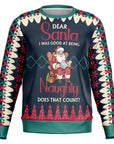 Navy Christmas sweater with Santa reading on a chair and the quote “Dear Santa I Was Good at Being Naughty” — festive and cheeky holiday humor from CollegeWares.