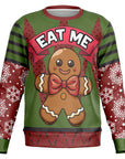 Green and red Christmas sweater with bold “EAT ME” text and gingerbread man graphic — naughty holiday humor from CollegeWares.