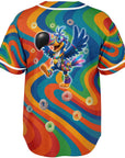 Back of a rainbow psychedelic rave baseball jersey with a cartoon rave toucan wearing kandi, smiley accessories, and trippy glasses. Colorful cereal loops float around the character over swirling orange, blue, green, and red patterns.