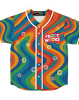 Front product shot of the Froot Wooks jersey with white piping, centered buttons, and “FROOT WOOKS” on the left chest. Cereal loops float across multicolored rainbow swirl patterns.