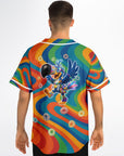 Man wearing the Froot Wooks rave jersey from the back. Features a dancing kandi-covered cartoon toucan surrounded by floating cereal loops on a rainbow psychedelic swirl background.
