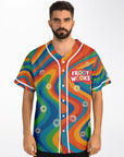 Front view of a man wearing the psychedelic Froot Wooks jersey with “FROOT WOOKS” chest text, floating cereal loops, white piping, and bold multicolor swirl patterns.