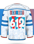 White and blue oversized rave hockey jersey with ice camo texture, bold FUCK ICE text on the front and ICE OUT 612 on the back, designed as an EDM jersey and festival hockey jersey for shows and rave culture from CollegeWares.