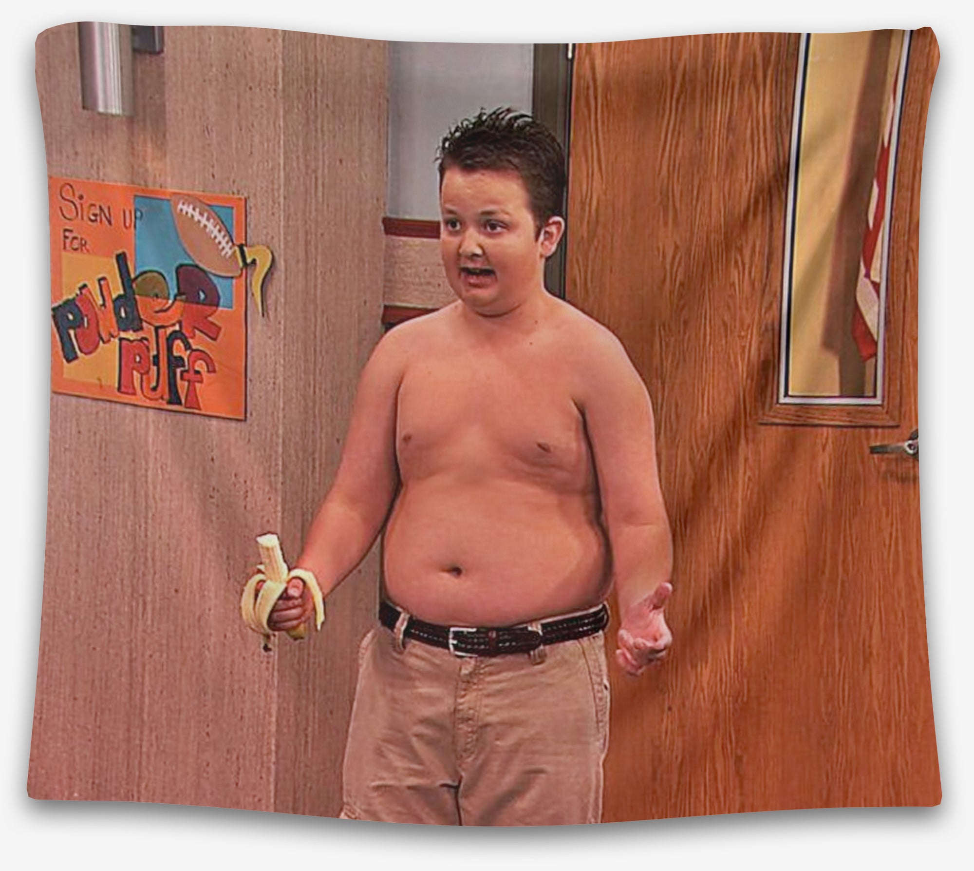 Tapestry of shirtless Gibby from iCarly holding a banana in a school hallway — chaotic meme wall art from CollegeWares.