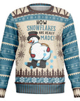 Beige and blue sweater with snowman bent over and “How Snowflakes Are Really Made” text — funny and inappropriate holiday humor by CollegeWares.