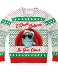 White Christmas sweater with green and red patterns and sarcastic “I Don’t Believe In You Either” Santa graphic — festive and cheeky from CollegeWares.