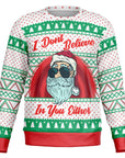 White Christmas sweater with green and red patterns and sarcastic “I Don’t Believe In You Either” Santa graphic — festive and cheeky from CollegeWares.