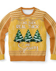 Yellow and orange Christmas sweater with “I Like Them Real Thick and Sprucey” slogan and snow-covered tree graphic — playful and punny design from CollegeWares.