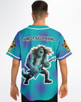 Back angle of the teal-and-purple parody EDM baseball jersey worn by a model, highlighting the animated monster shredding a guitar — festival jersey for bassheads from CollegeWares.