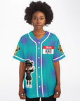Front view of a teal EDM baseball jersey with white piping, a ‘Hello My Name Is King’ badge, and a screaming rave gremlin character — cartoon-chaos festival clothing for bass fans from CollegeWares.
