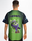 Man wearing the green space-themed jersey with the one-eyed mascot graphic centered on the back and the “WUBZOWSKI” text above it.