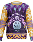 Purple and gold Christmas sweater with a crystal ball and “My Crystal Ball Says You’re Full of Shit” slogan — witchy, sarcastic holiday apparel from CollegeWares.
