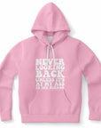 Pink hoodie featuring chunky white letters with the phrase “NEVER LOOKING BACK UNLESS IT’S AT MY ASS IN THE MIRROR” — playful, cheeky, and confident from CollegeWares.