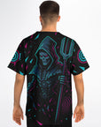 Man facing away in a black baseball jersey displaying the neon cyan and magenta Riddim Reaper graphic centered on the back with shard-like gradients extending across the shoulders and sleeves.