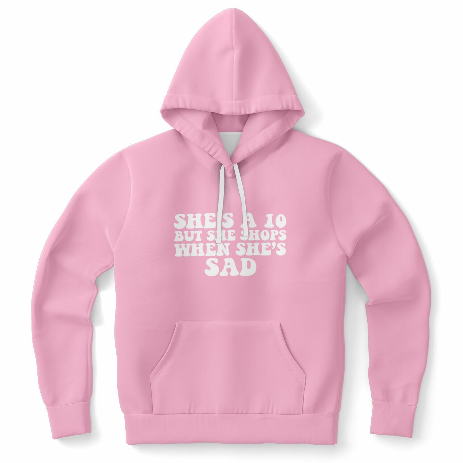 Pink hoodie with “She’s a 10 But She Shops When She’s Sad” in large bold white text — emotional spending humor with hot girl energy from CollegeWares.