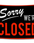 Parody flag that mimics a vintage storefront sign, saying “Sorry We’re Closed” in bold red and gray text — playful party shutdown vibes from CollegeWares.