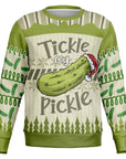 Green adult humor Christmas sweater featuring a cartoon pickle in a Santa hat and the slogan “Tickle My Pickle” — cheeky and bold from CollegeWares.