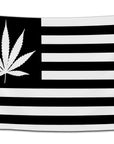 Flag with a black and white American flag design featuring a marijuana leaf where the stars would be — minimalist weed flag from CollegeWares.