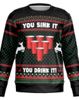 Black and green Christmas sweater with beer pong red solo cups and “You Sink It You Drink It” slogan — festive party humor from CollegeWares.