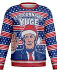 Blue and red Christmas sweater with cartoon Trump wearing a Santa hat and “It’s Gunna Be YUGE” slogan — patriotic parody design from CollegeWares.