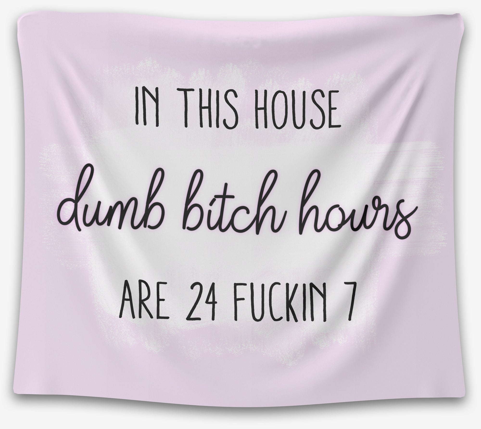 Pink tapestry with bold black script and all-caps text reading “In this house dumb bitch hours are 24 fuckin 7” — chaotic quote wall art from CollegeWares.
