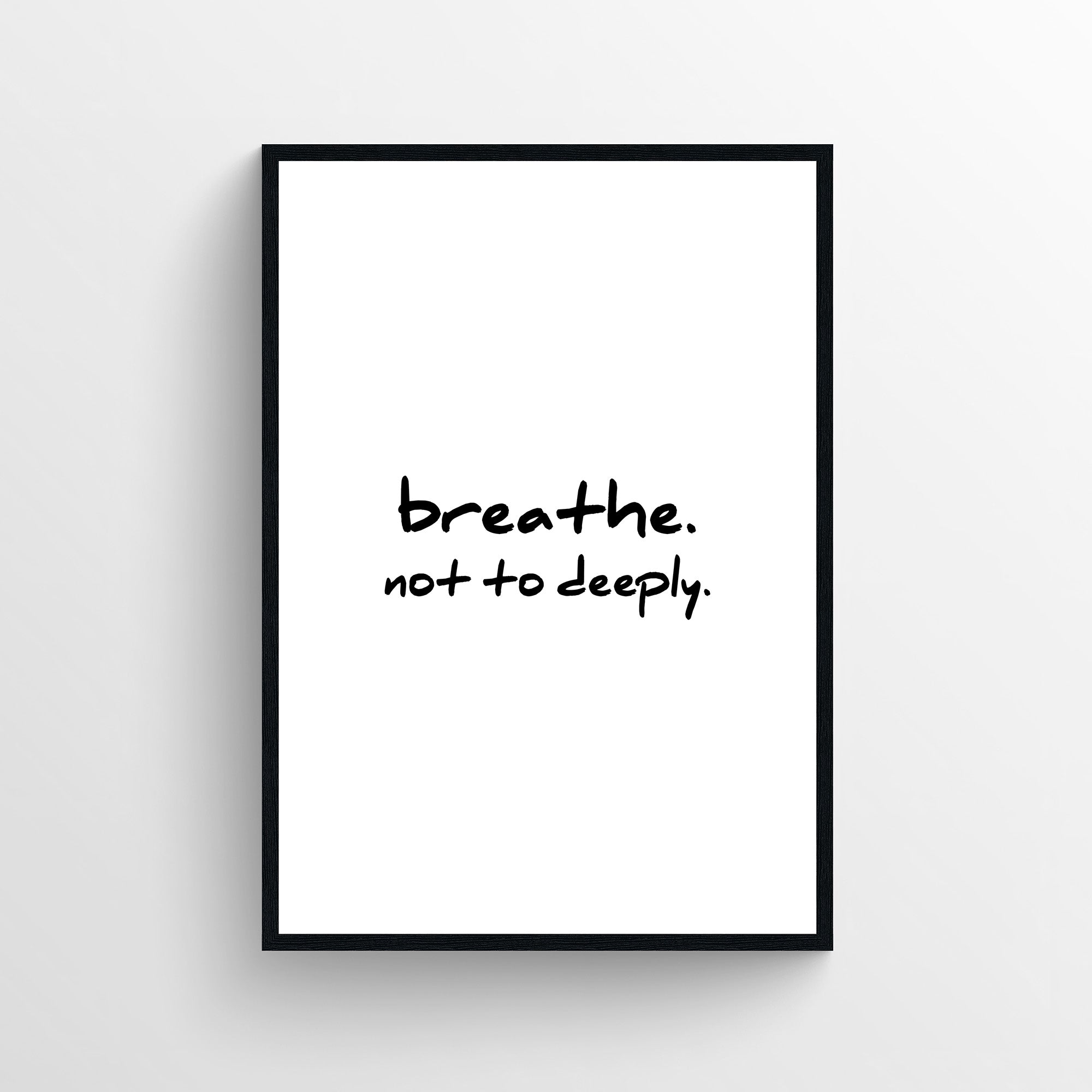 Minimalist funny bathroom poster with handwritten text reading “breathe. not to deeply.” Simple black and white bathroom wall art designed for guest bathrooms and restrooms with subtle restroom humor decor from CollegeWares.