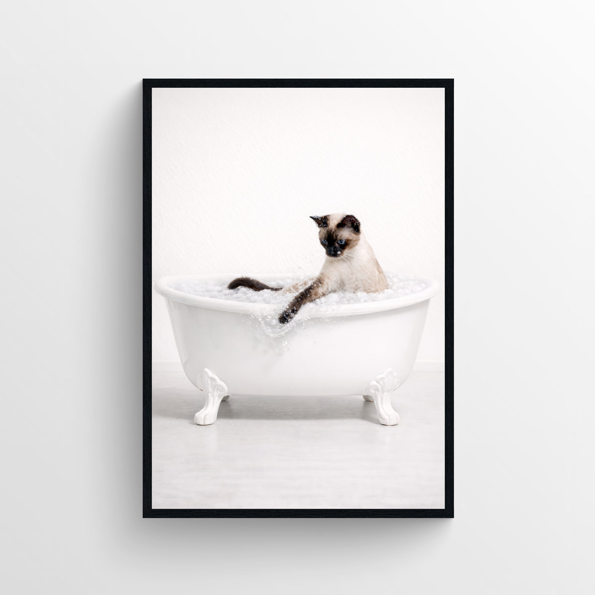 Photorealistic Siamese cat sitting in a white clawfoot bathtub filled with bubbles, one paw resting on the tub edge — minimalist animal bath wall art with subtle humor for modern bathrooms.