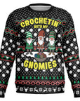 Black Christmas sweater with cartoon gnomes and “Crochetin’ With My Gnomies” text — quirky holiday knitwear from CollegeWares.