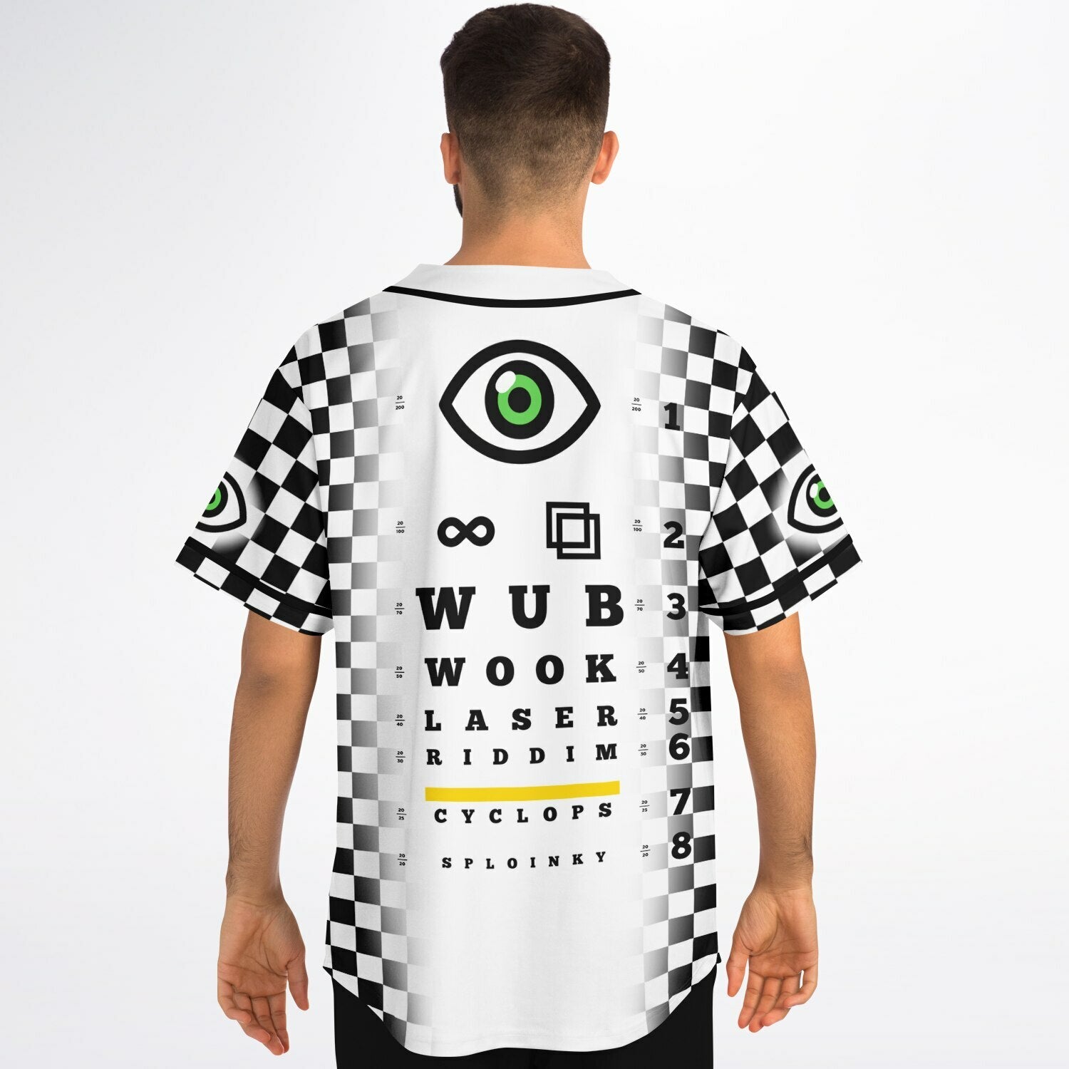 Black-and-white checkerboard rave jersey on a man facing away. The back features the cyclops eye, infinity symbol, stacked eye-chart text reading WUB, WOOK, LASER, RIDDIM, and a yellow-highlighted CYCLOPS line. Checkerboard gradient panels run down both sides with matching eye patches on the sleeves.