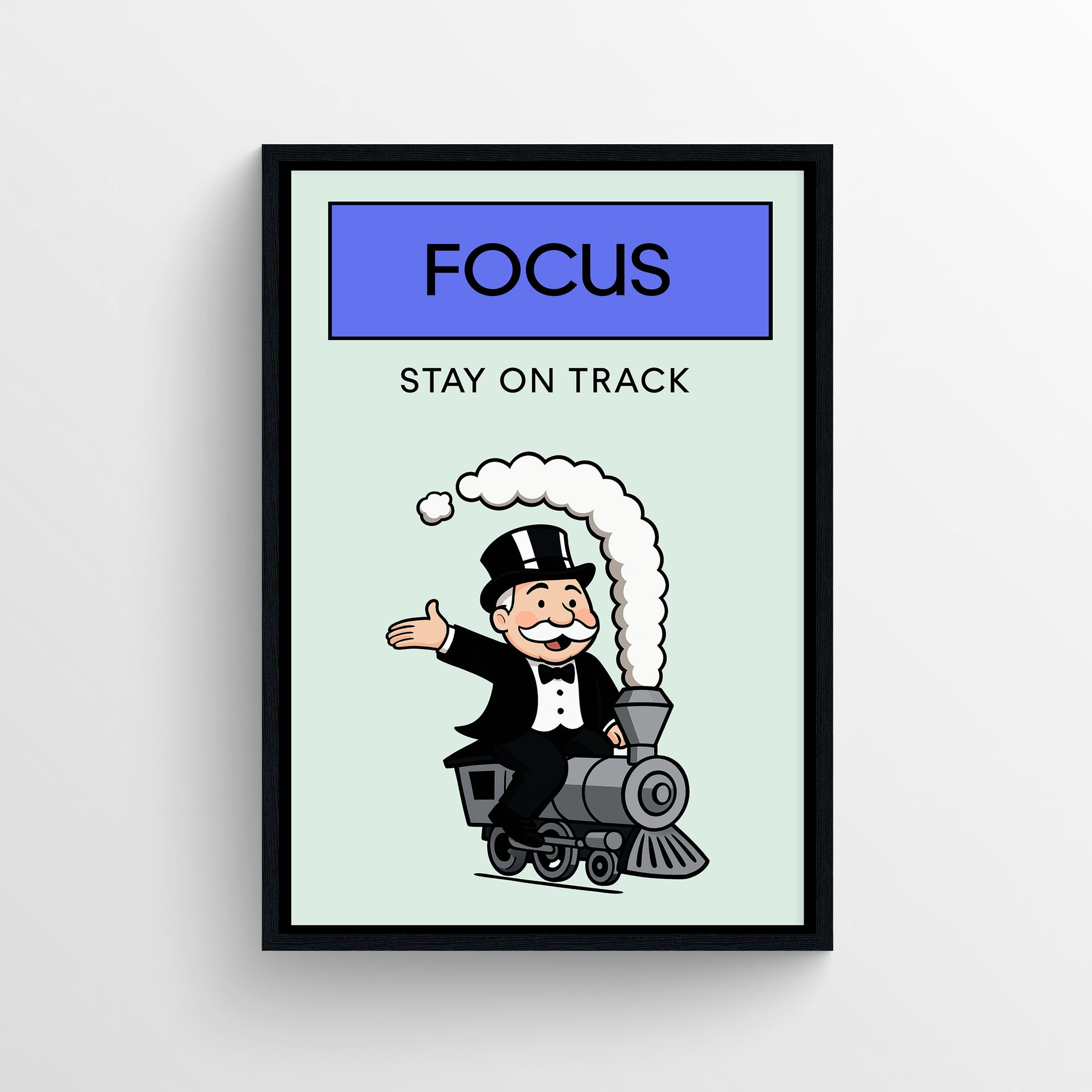 Minimalist “Focus — Stay on Track” poster with a blue header, clean text, and a cartoon character riding a small train — modern motivational wall art for college rooms, studios, and home offices by CollegeWares.