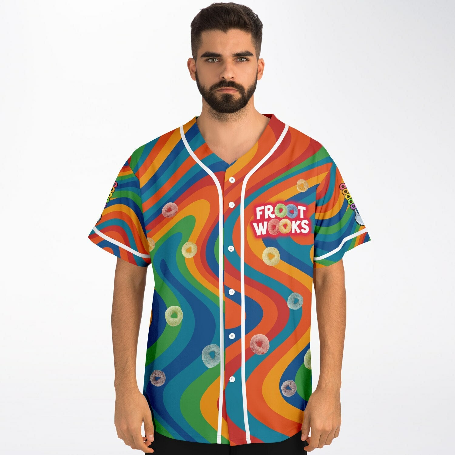 Front view of a man wearing the psychedelic Froot Wooks jersey with “FROOT WOOKS” chest text, floating cereal loops, white piping, and bold multicolor swirl patterns.