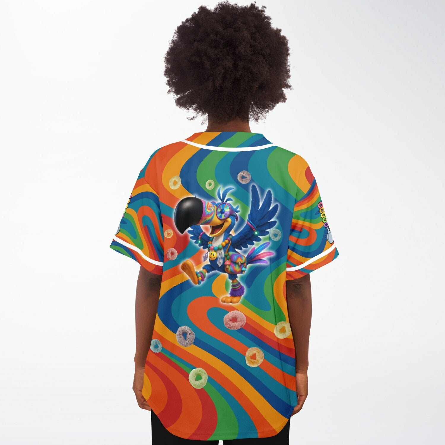 Woman wearing a rainbow psychedelic rave jersey with a dancing cartoon toucan covered in kandi and smiley charms. Floating cereal loops surround the character over swirling neon background colors.