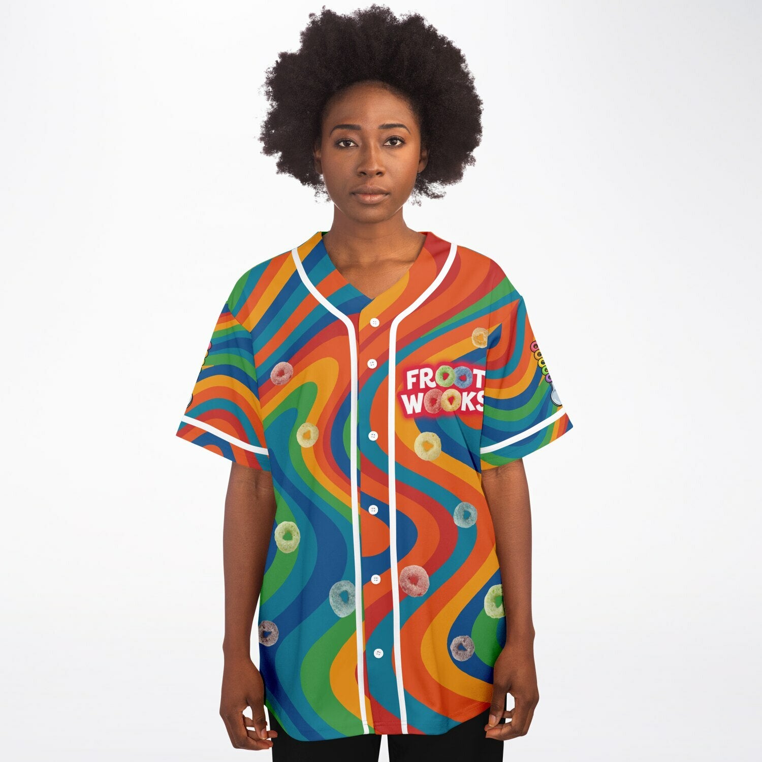 Front view of a woman wearing the psychedelic Froot Wooks jersey. “FROOT WOOKS” text sits on the left chest with floating cereal loops and bold rainbow swirl patterns across the whole front.
