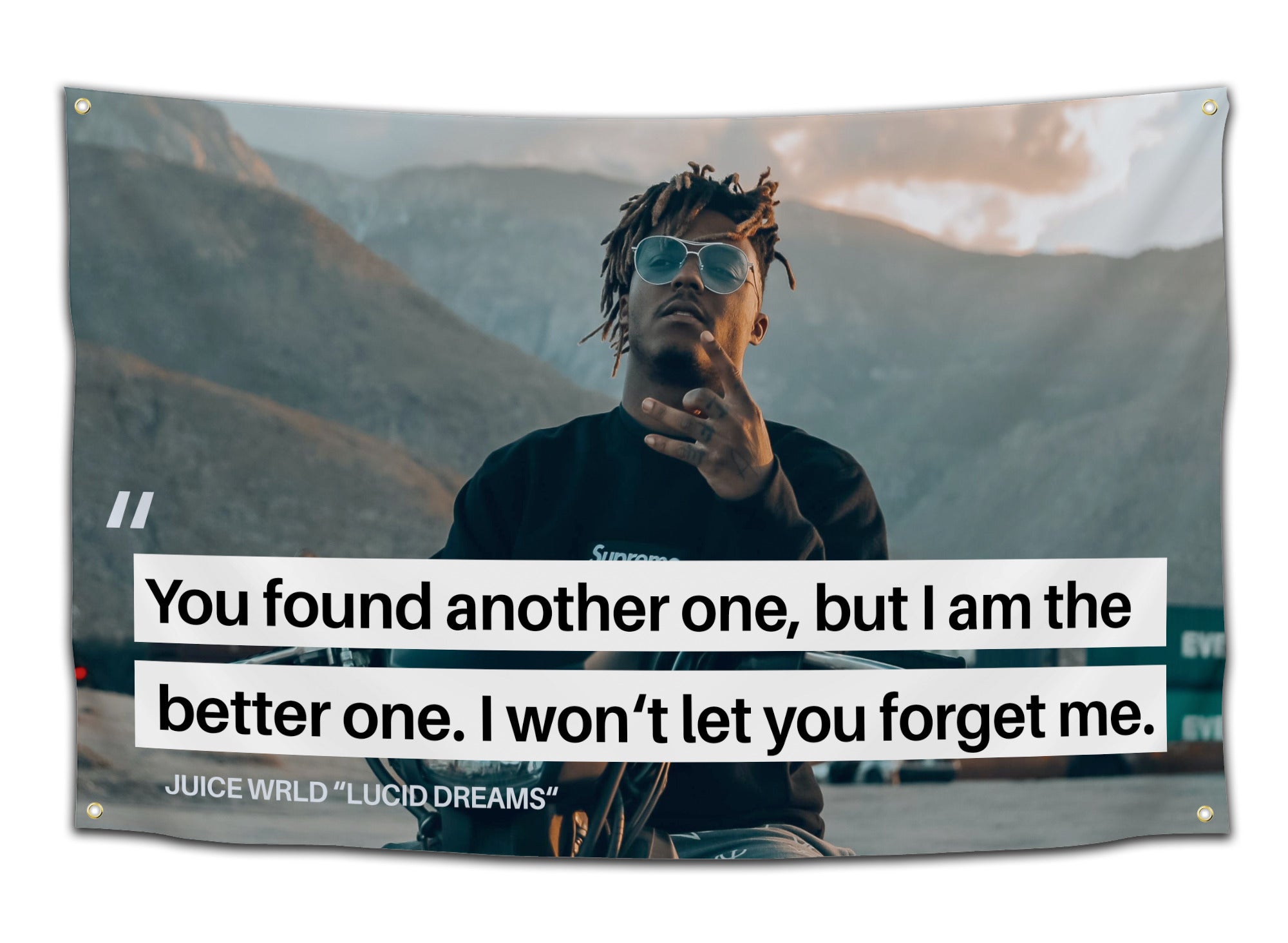 Flag with rapper Juice WRLD wearing sunglasses against a mountain backdrop, featuring lyrics “You found another one, but I am the better one. I won’t let you forget me.” – tribute wall flag from CollegeWares.