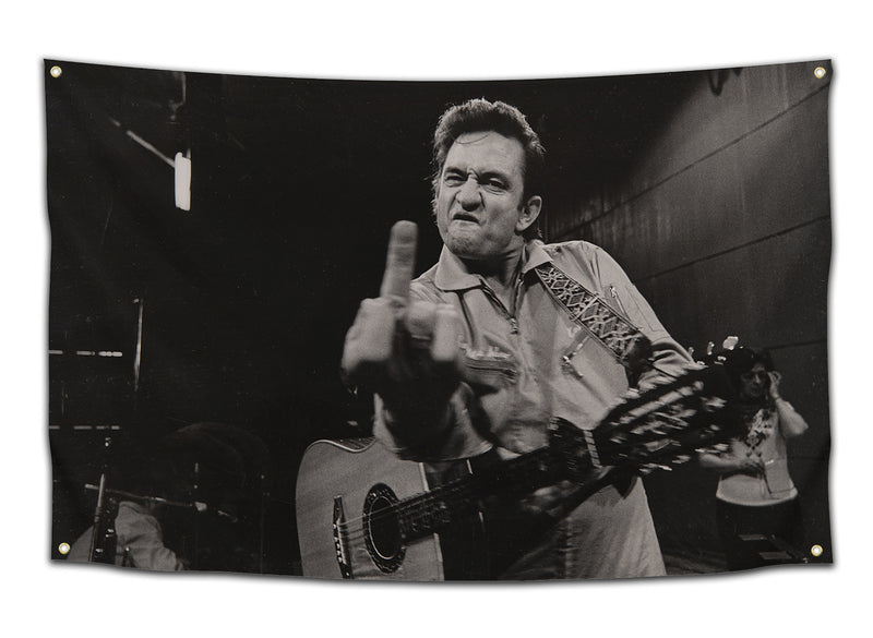 Black-and-white flag with Johnny Cash flipping off the camera while holding a guitar — bold and rebellious music-themed dorm flag for edgy college rooms and rock fans by CollegeWares.