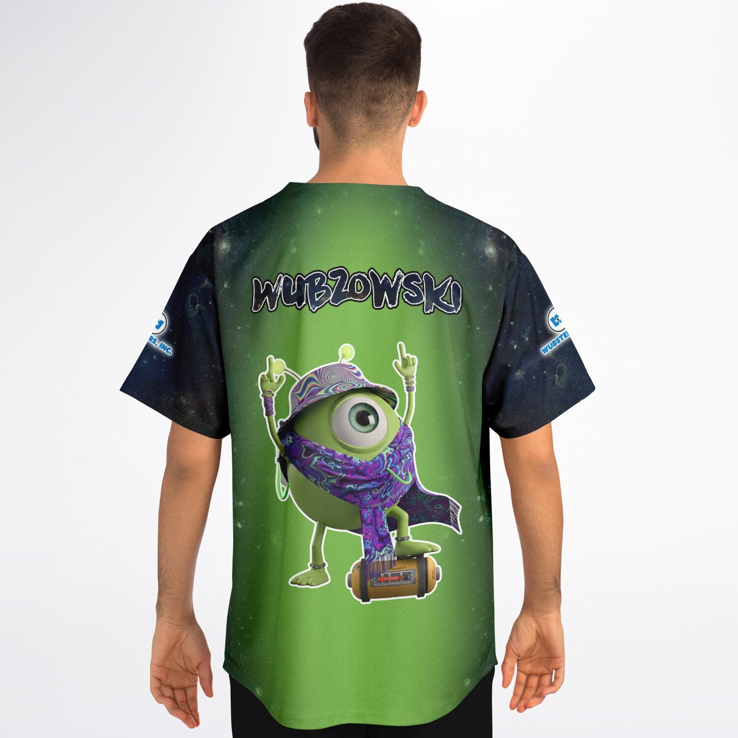 Man wearing the green space-themed jersey with the one-eyed mascot graphic centered on the back and the “WUBZOWSKI” text above it.