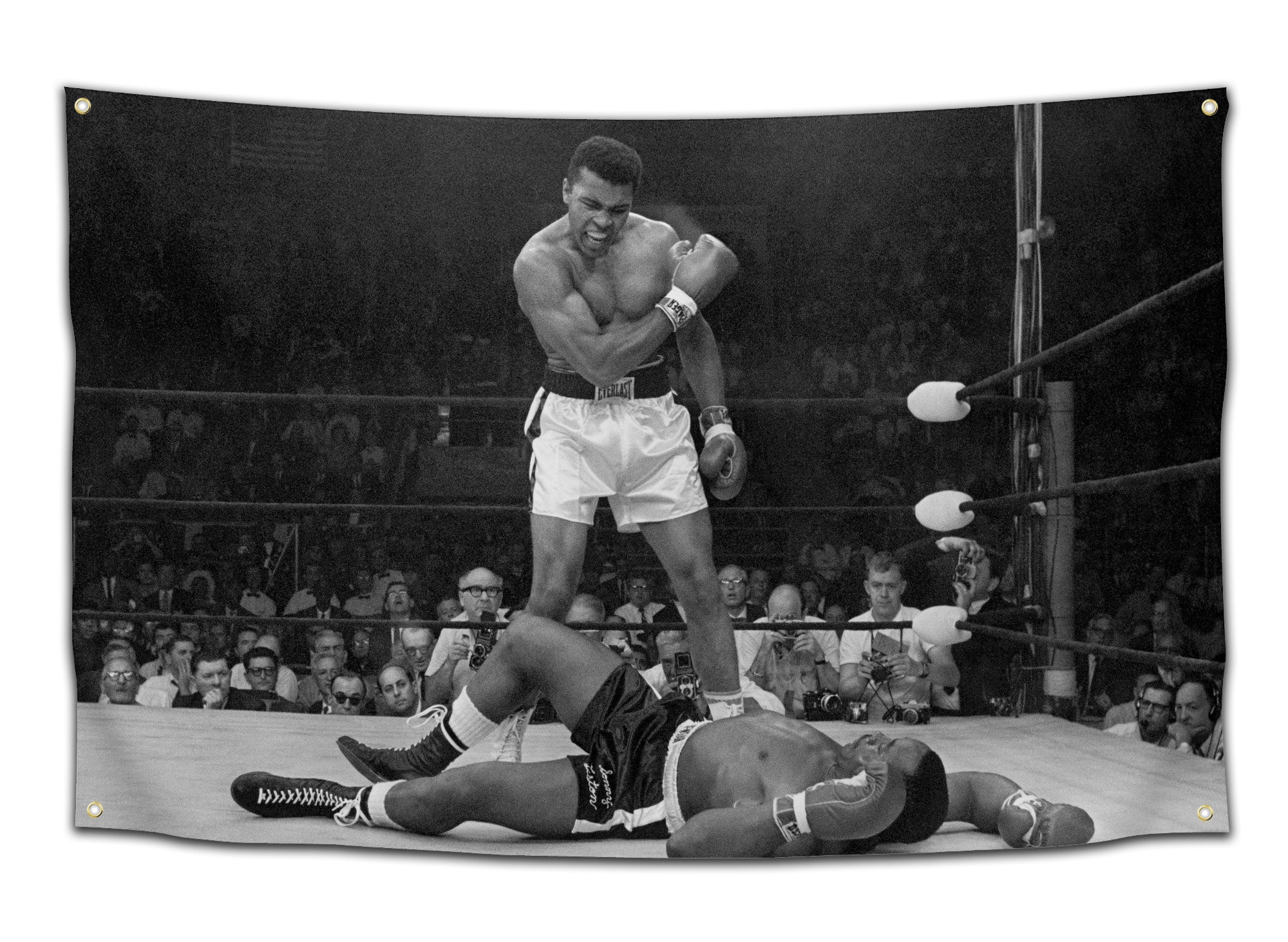 Black and white flag featuring Muhammad Ali standing over Sonny Liston after a KO — classic sports history moment printed as badass dorm room or man cave decor for alpha vibes from CollegeWares.