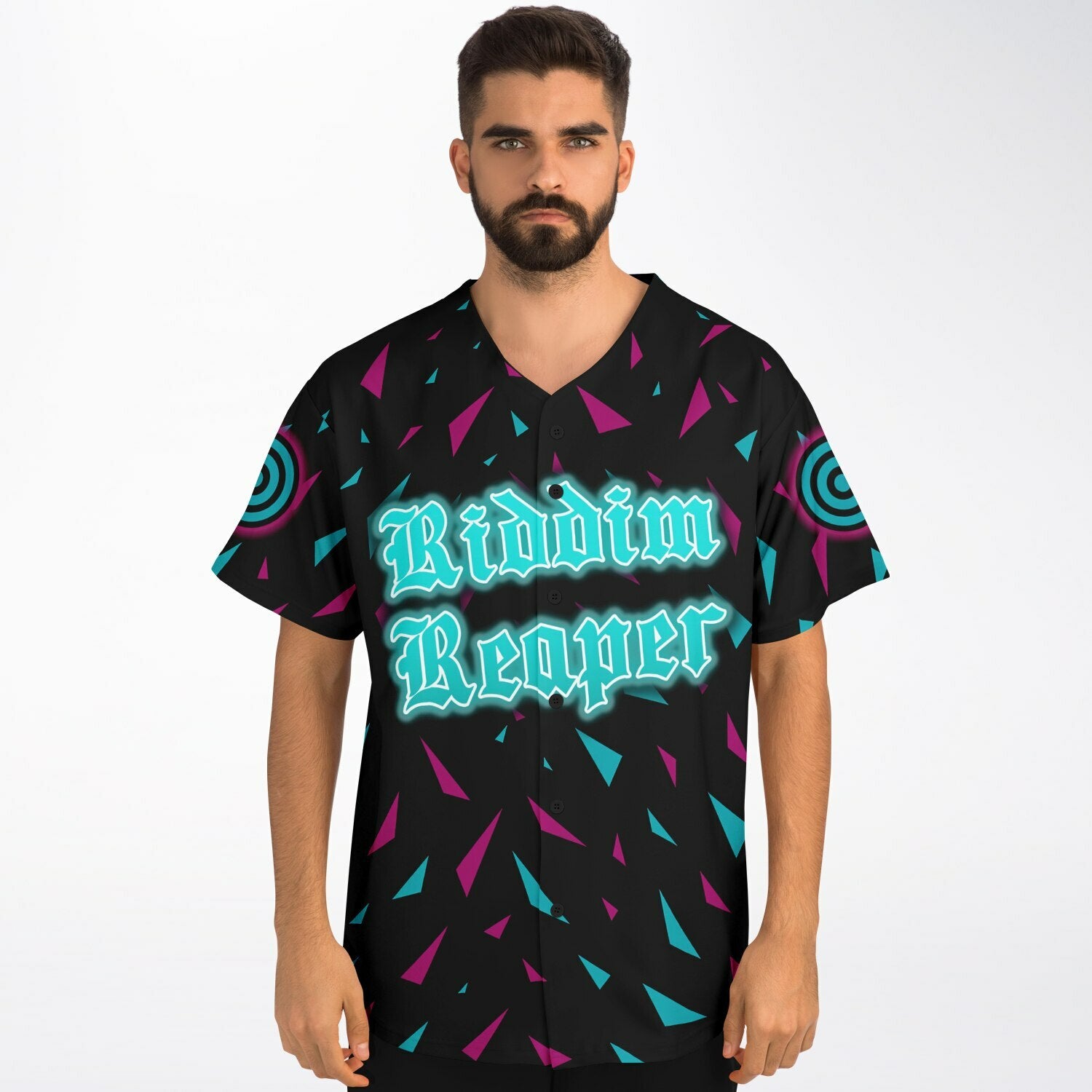 Front view of a man wearing a black baseball jersey with white piping, neon cyan and magenta shard patterns across the shoulders, and a small reaper trident emblem on the left chest.