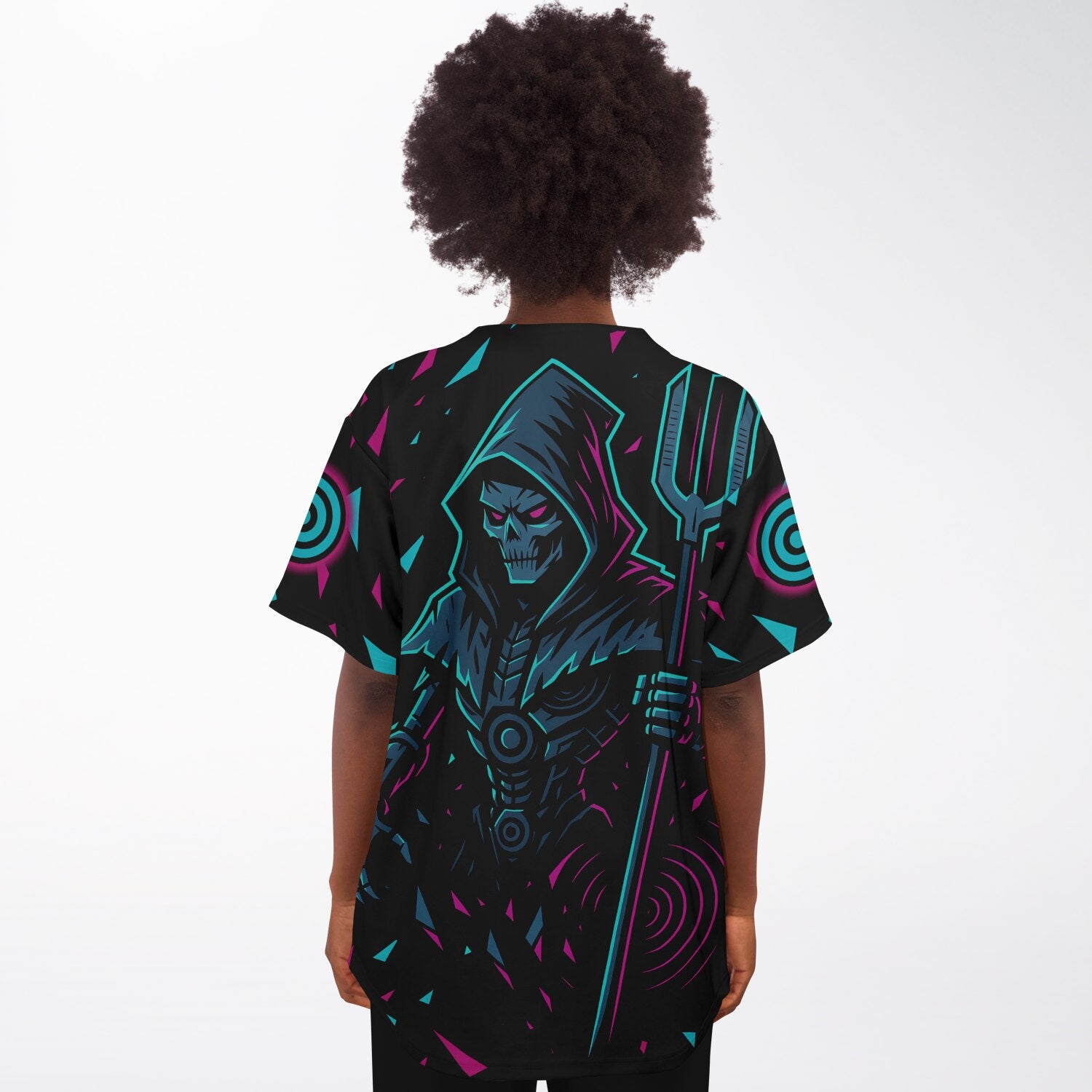 Woman wearing a black baseball jersey with neon cyan and magenta shard gradients and a large hooded skeleton reaper holding a trident centered on the back. Colors spread outward from the figure across both sleeves.