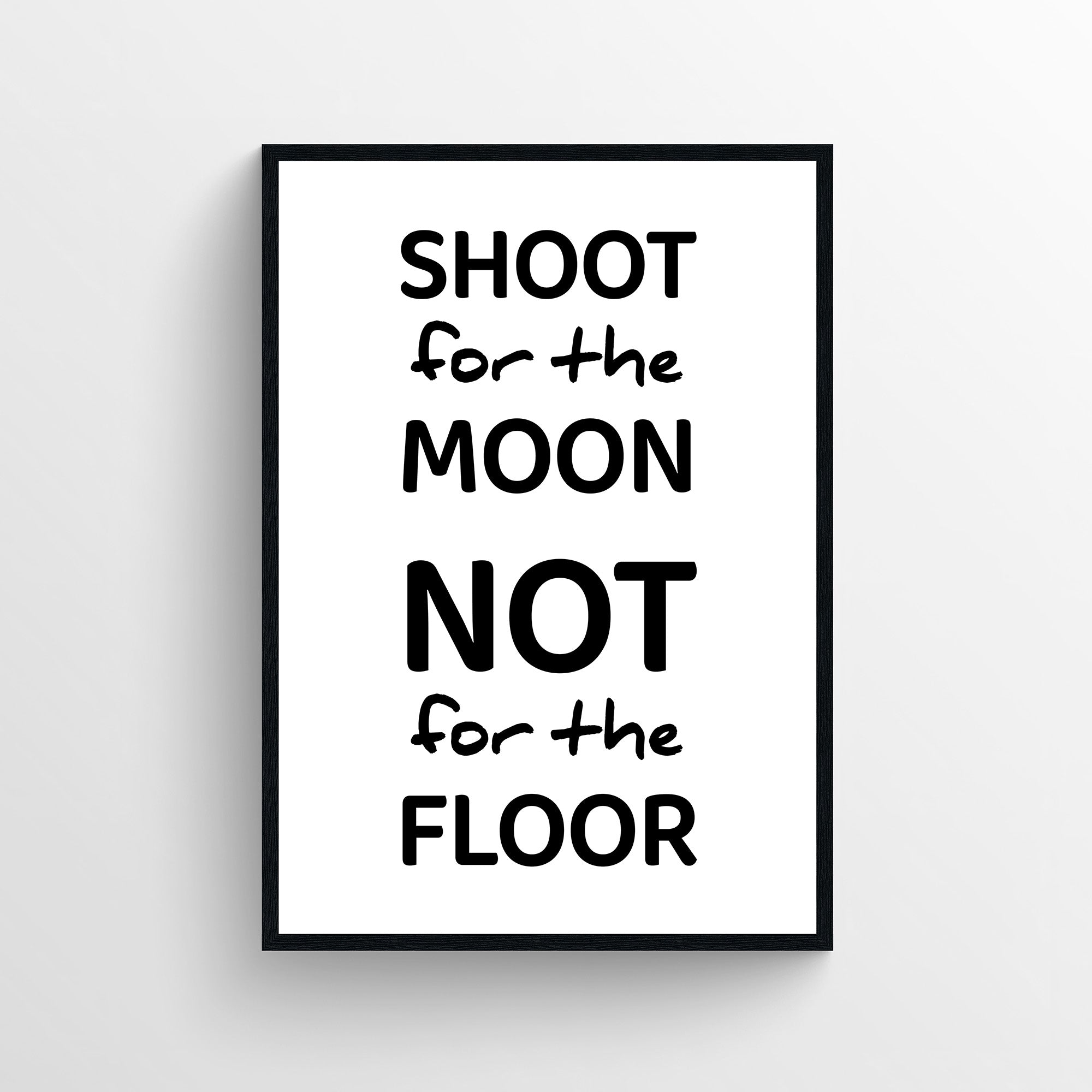 Funny bathroom poster with the phrase “Shoot for the Moon Not for the Floor” in bold and handwritten typography. Humorous bathroom wall art designed for guest bathrooms and restrooms from CollegeWares.