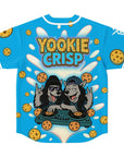 Back of Yookie Crisp EDM baseball jersey with two cartoon wolf DJs mixing on cookie turntables under the bold Yookie Crisp logo, surrounded by scattered cookies and creamy milk splashes on a neon blue background.