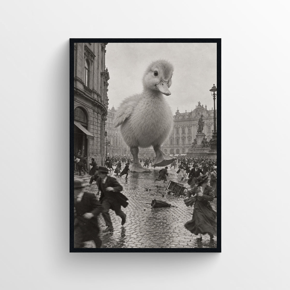 Black-and-white surreal poster showing a giant fluffy duckling walking through a crowded rain-soaked historic city street — vintage-style wall art from CollegeWares.