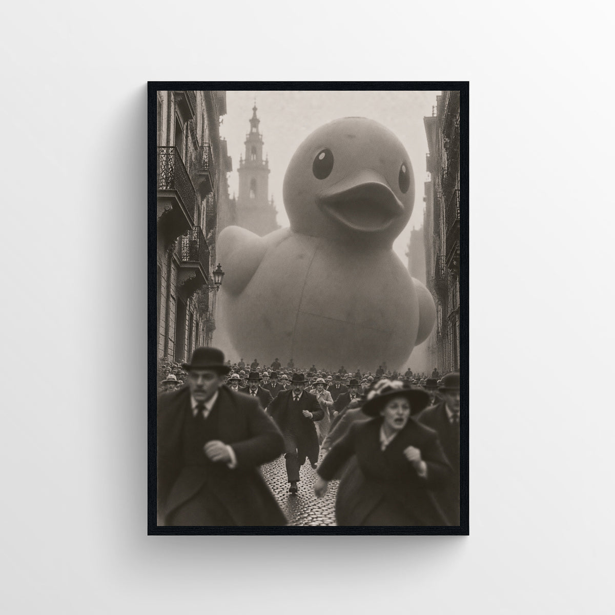 Black-and-white surreal poster showing a giant rubber duck filling a crowded rain-soaked historic European city street — vintage-style wall art from CollegeWares.